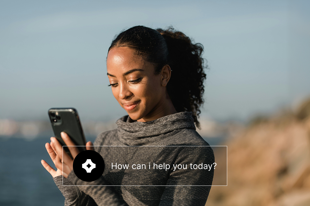 A person using SafeLend's AI Agent chat assistant on a phone